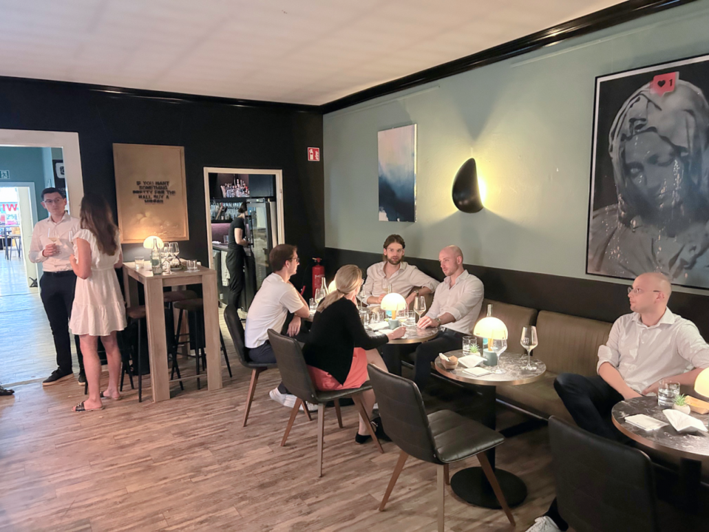 a group of people sitting at a table